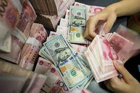 Chinese Yuan strengthens to 7.0363 against the dollar